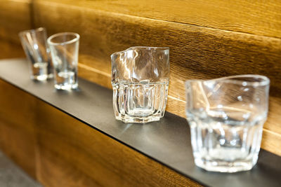 Close-up of glass on shelf