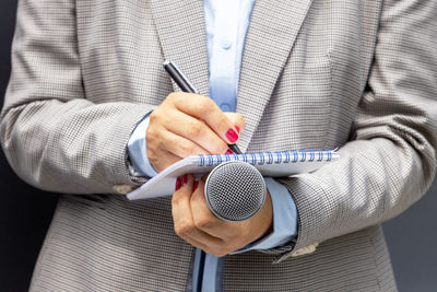 Close-up of man using mobile phone