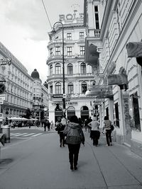 People walking on city street