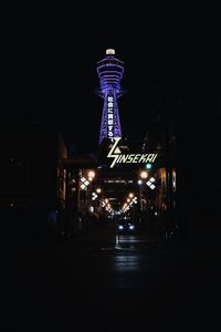 Illuminated city buildings at night