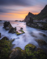 Scenic view of sea against sky during sunset