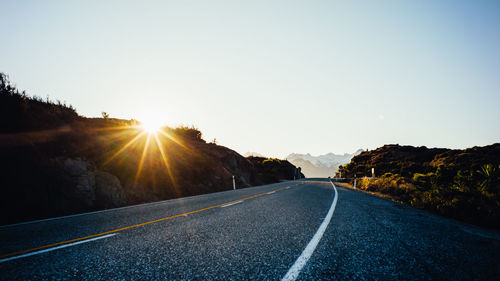 Empty road at sunset