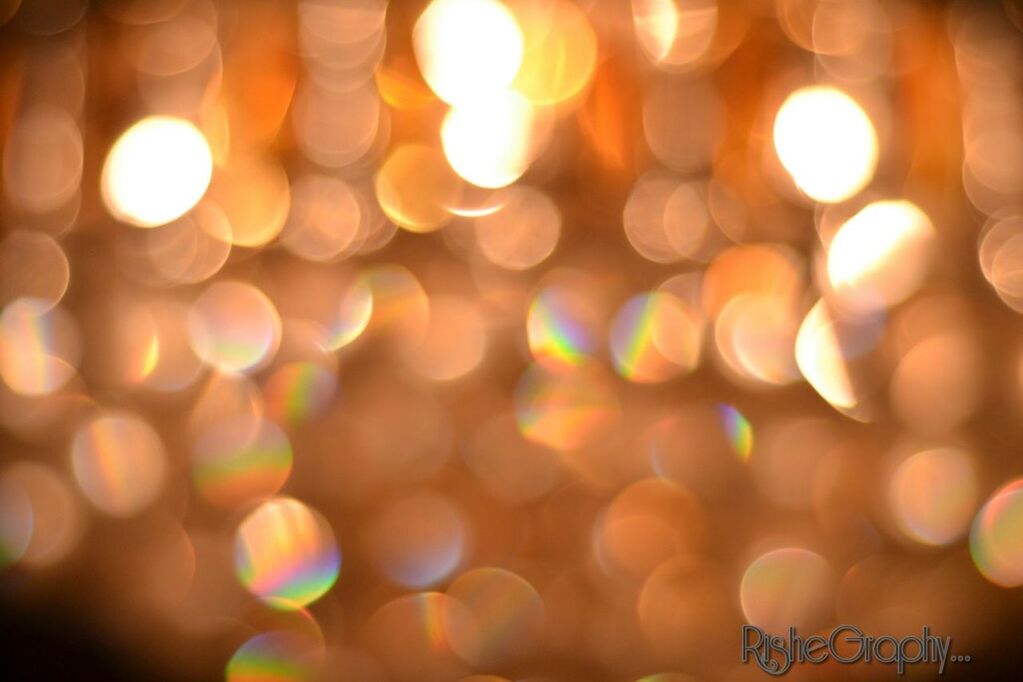 illuminated, defocused, night, lighting equipment, light - natural phenomenon, glowing, lens flare, circle, focus on foreground, multi colored, light, selective focus, close-up, pattern, decoration, no people, abstract, outdoors, electric light, built structure