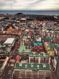 High angle view of buildings against sky in city