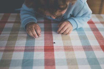 High angle view of boy on table