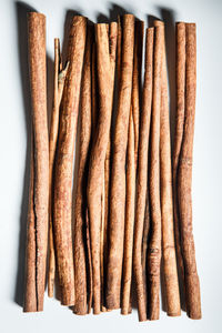 High angle view of bread on table against white background