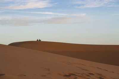 Scenic view of desert against sky