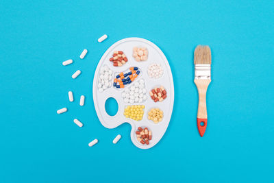 High angle view of breakfast on table against blue background