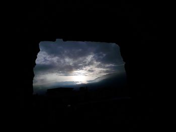 Low angle view of storm clouds at night