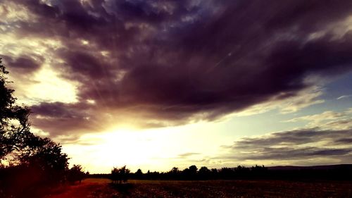 Scenic view of dramatic sky during sunset