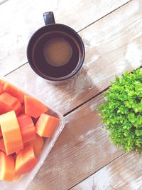 High angle view of coffee cup on table