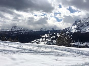 Scenic view of snowcapped mountains against sky