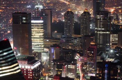 Illuminated cityscape at night