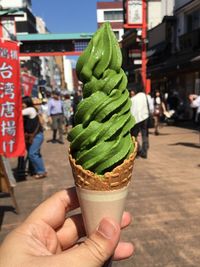 Woman holding ice cream cone