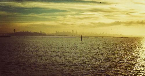 Scenic view of sea at sunset