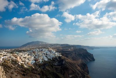 Scenic view of sea against cloudy sky