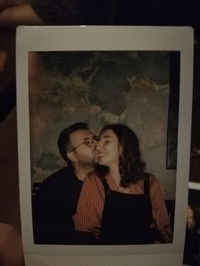 Portrait of couple kissing