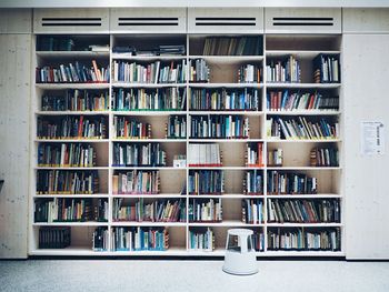 Books on shelves in library