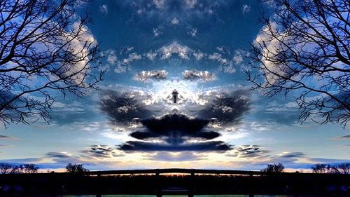 Scenic view of landscape against sky at sunset