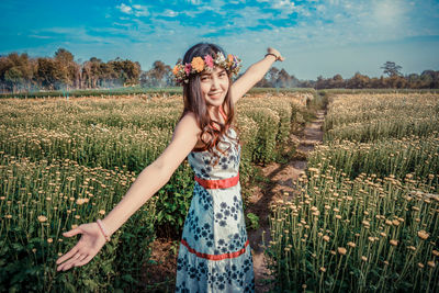 Woman standing on field