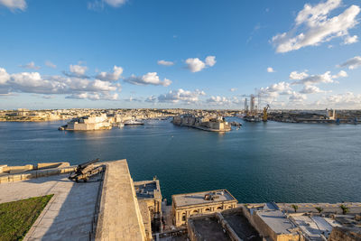 High angle view of bridge over river against cloudy sky