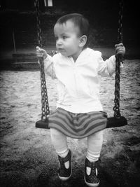 Full length of girl standing in pond