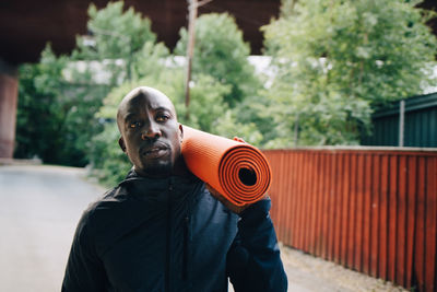 Portrait of man standing outdoors