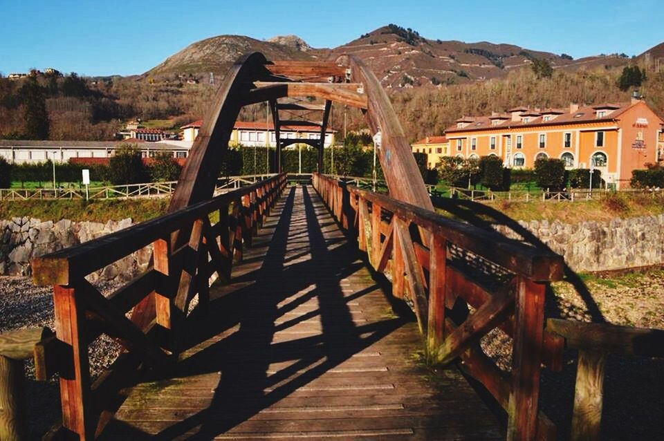 sunlight, outdoors, adventure, no people, landscape, bridge - man made structure, day, sky