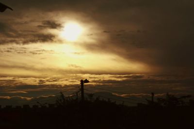 Scenic view of silhouette landscape against sky during sunset