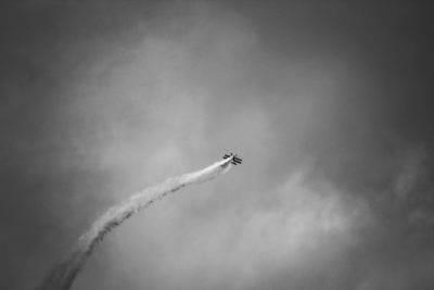 Low angle view of airshow in sky