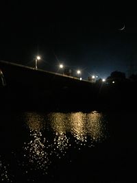 Illuminated street light at night