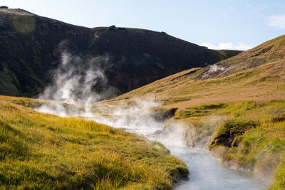 Boiling hot creek in mountain landscape