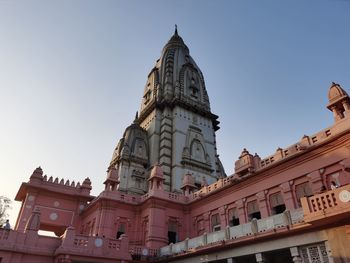 Low angle view of buildings against clear sky