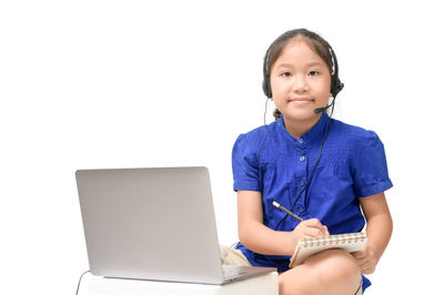 Coronavirus outbreak. cute asian girl student wear headphone study online isolated 