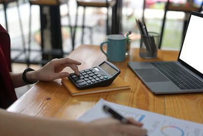 Man using laptop on table