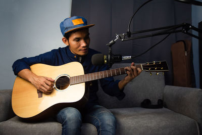 Young man playing guitar