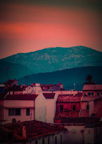 High angle view of townscape against sky at sunset