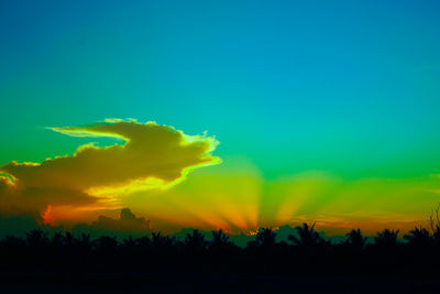 Scenic view of dramatic sky during sunset