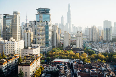 Modern buildings in city against sky