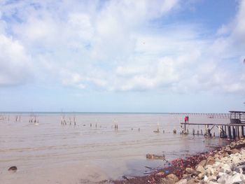 Scenic view of beach against sky