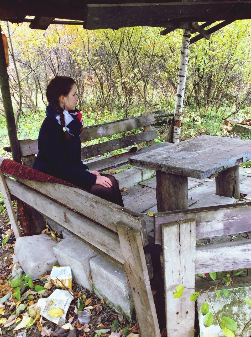 sitting, wood - material, bench, relaxation, lifestyles, leisure activity, tree, full length, wooden, leaf, casual clothing, day, person, standing, outdoors, nature, park - man made space, childhood