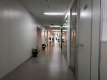 People walking in corridor