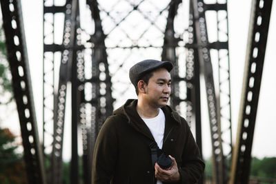 Portrait of young man looking away