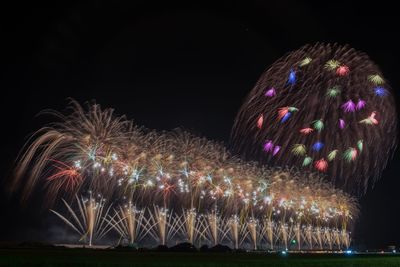 Low angle view of firework display