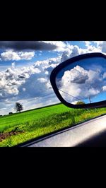 Road passing through field