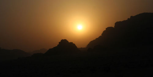 Scenic view of mountains at sunset