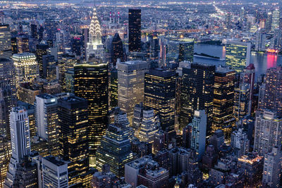High angle view of illuminated buildings in city