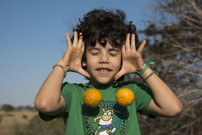 Boy playing outdoors