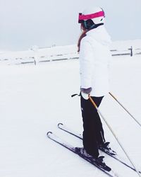Young woman on ski slope