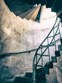 Low angle view of spiral staircase in building